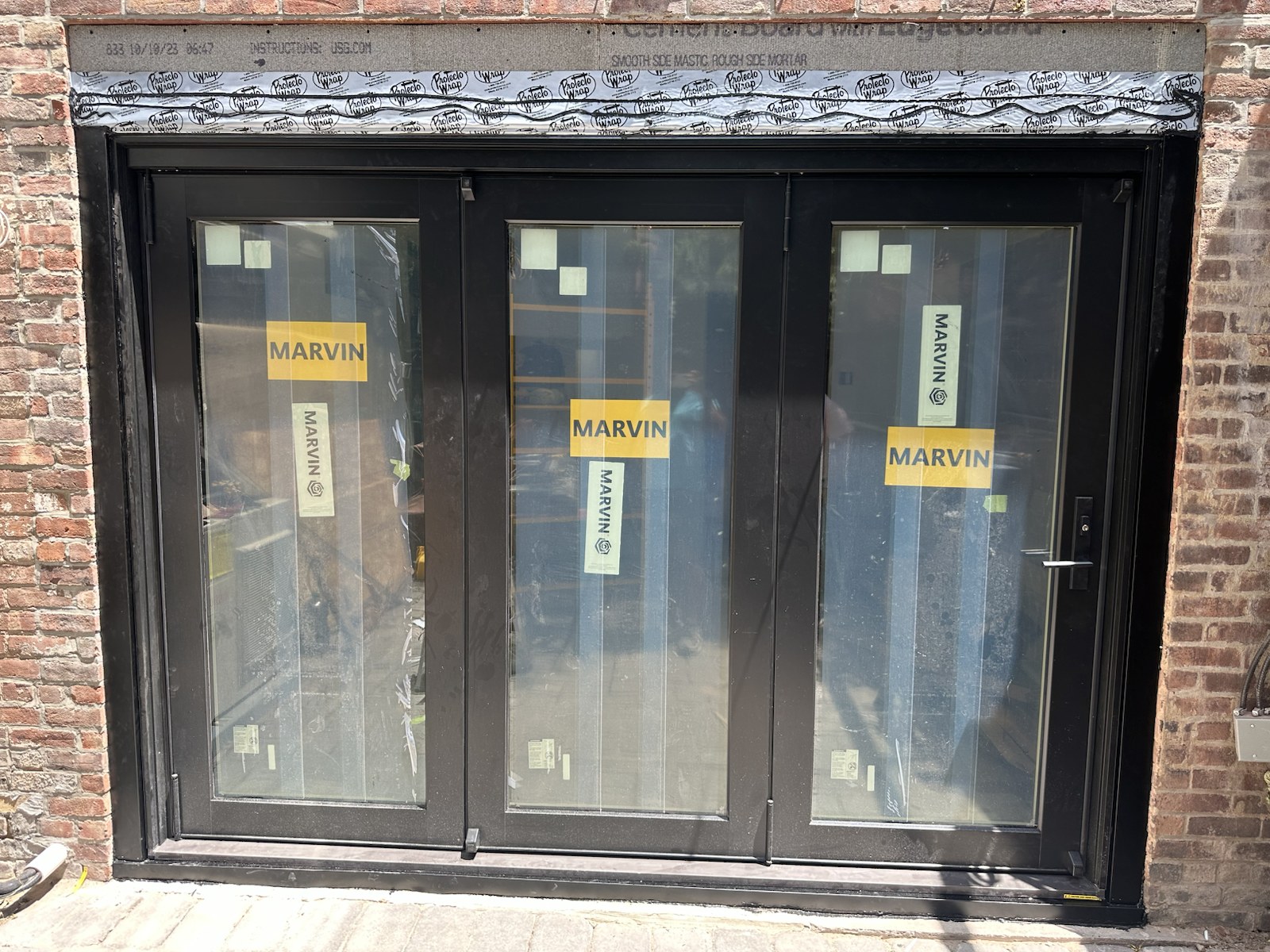 Completed folding patio door in the closed position
